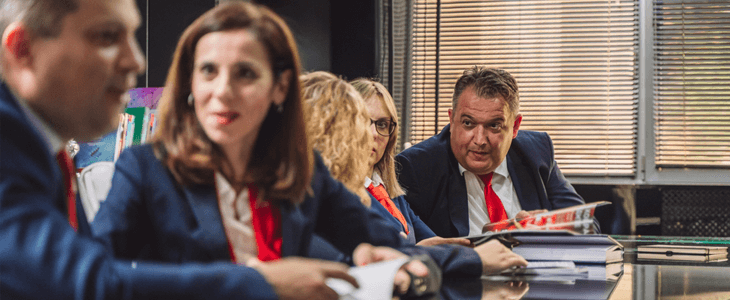 government members in a meeting
